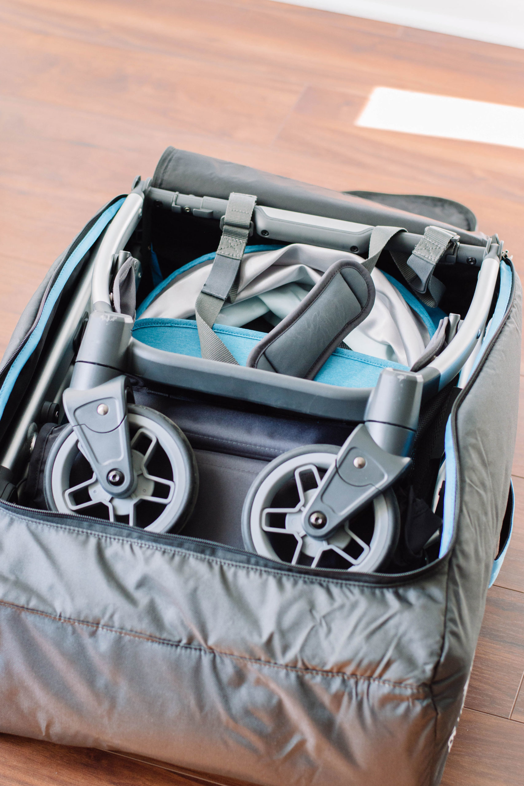 Mr. Toddler and I strolling along in the UPPAbaby MINU - here's our full UPPAbaby MINU Review so that you can make the best stroller decision for you and your fam.