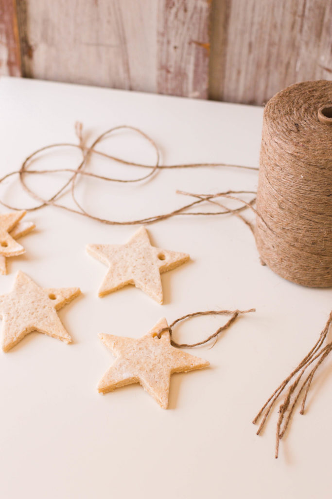 This Christmas Garland is made up of jute cord and our easy salt dough recipe. Such a cute holiday project to make with your kiddos this season!