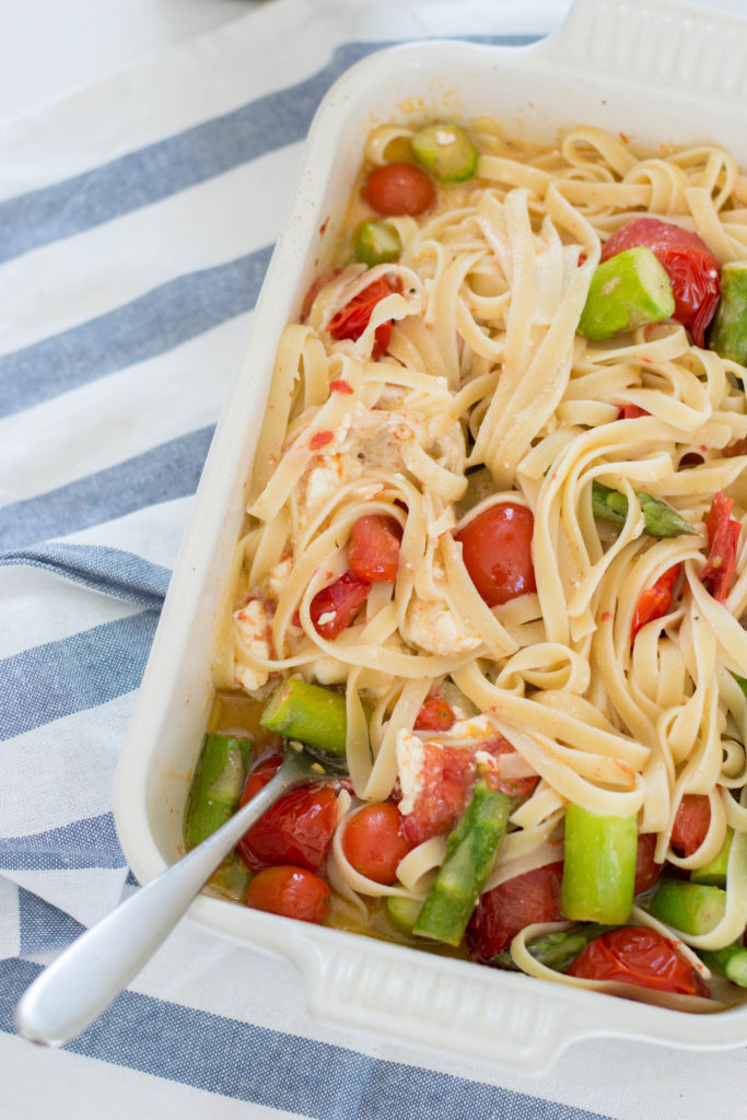 Hopped on the viral baked feta pasta challenge… and you know what? So. Worth. It. Check out our delicious variation with cherry tomatoes, asparagus, feta, and fettuccine.