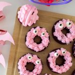 Love the idea of a pink Halloween? So do we! Head over to our recipe tutorial so you can learn how to make some homemade Halloween Donuts! They’re SUPER easy to whip-up!