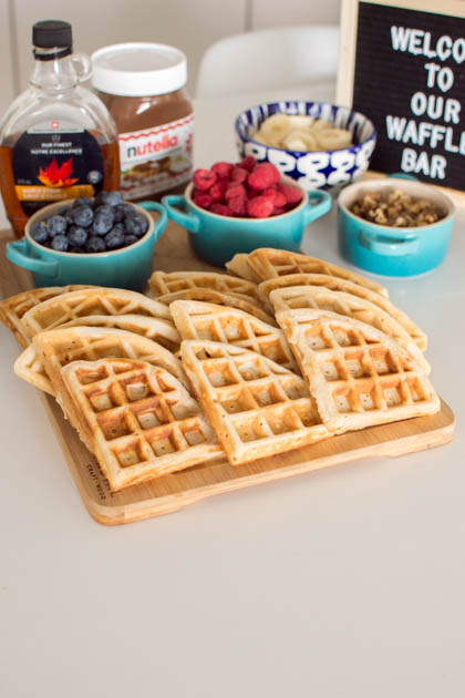 Sunday brunch will never be the same: put together your very own waffle bar to impress your guests! It just takes a few bowls of delicious waffle toppings like fruit, nuts, condensed milk, syrup, and chocolate chips!