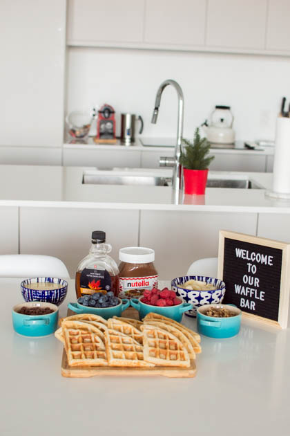 Sunday brunch will never be the same: put together your very own waffle bar to impress your guests! It just takes a few bowls of delicious waffle toppings like fruit, nuts, condensed milk, syrup, and chocolate chips!