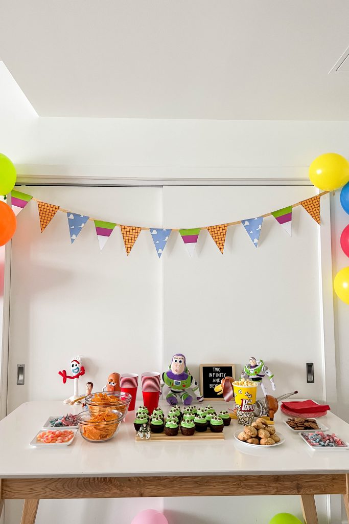 Setting up a themed birthday inspired by Toy Story is not hard at all! Take a look at how we set up this adorable Two Infinity and Beyond Birthday in a few steps!